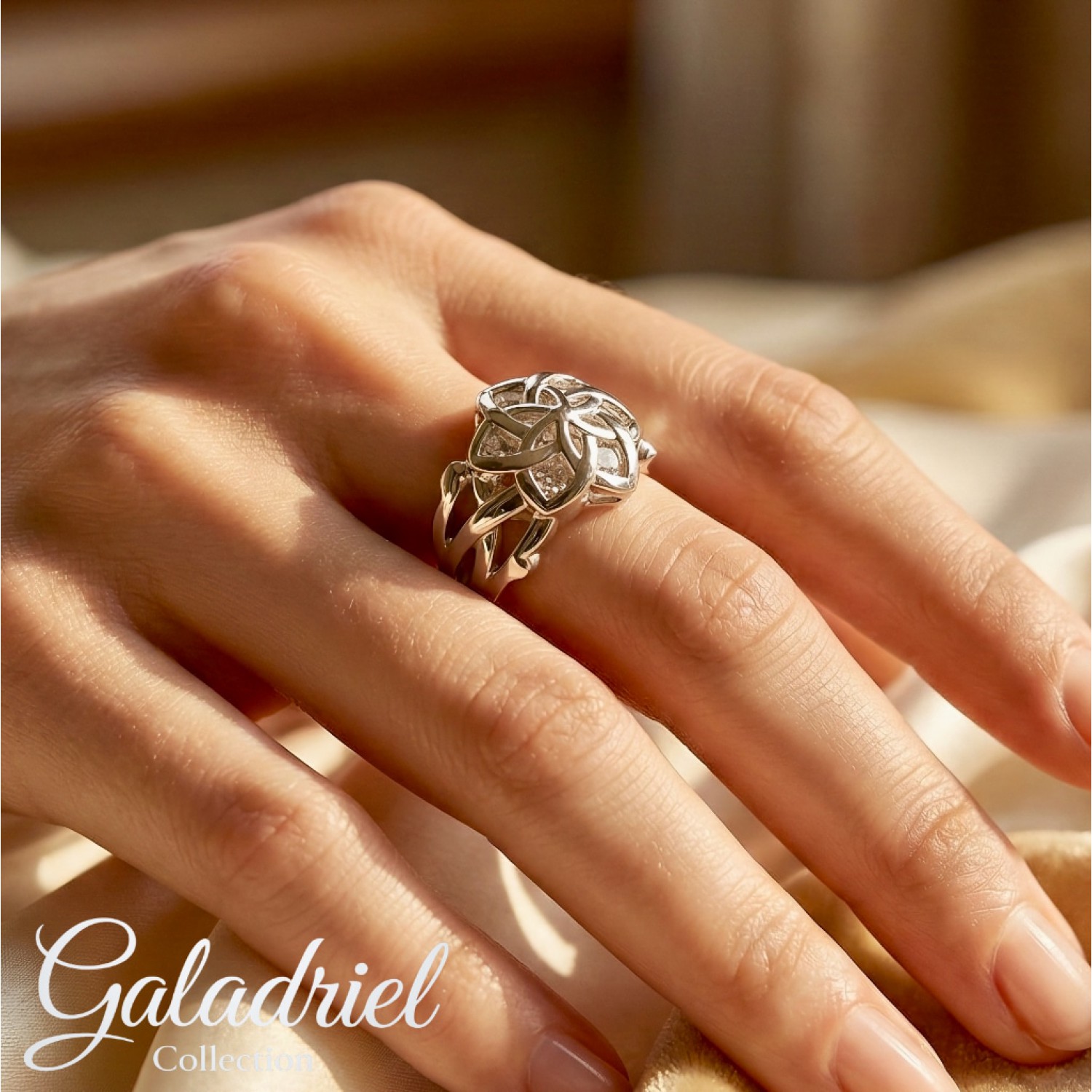 Official Nenya Ring of Galadriel in solid 925 sterling silver with cage-set cubic zirconia, Mallorn leaf design, handcrafted in New Zealand by Lord of the Rings licence holders — available in clear, blue, and purple stone