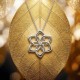 Official The Hobbit Galadriel Flower Pendant in solid 925 sterling silver with claw-set cubic zirconia centre, 30mm, New Line Productions licensed, made in New Zealand