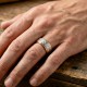 Close-up of a men's custom wedding ring. The band is 6mm wide with a two-tone construction. The outer rails and interior are high-polish 9k yellow gold. The center channel features a white gold insert with a matte satin finish and a deep-etched diagonal b
