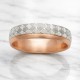 Two-tone gold wedding band featuring a continuous white gold Greek Key pattern with polished yellow gold rails.